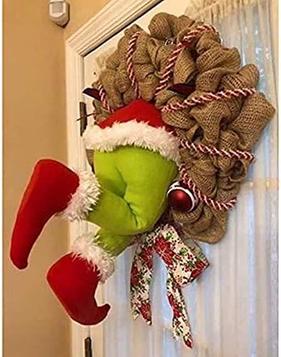 Kako se Grinch ukrao božićni vijenac, punjene noge zaglavljene u zidnom božićnu burlup vijenac